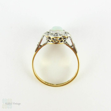 Antique Opal & Diamond Ring, Oval Cabochon Cut Opal with Diamond Halo. Circa 1910s, 18ct Gold & Platinum.