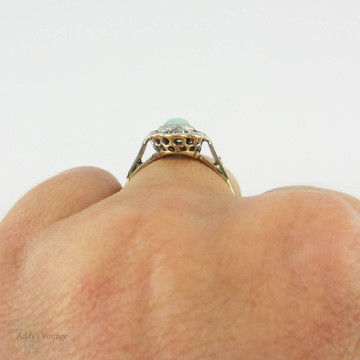 Antique Opal & Diamond Ring, Oval Cabochon Cut Opal with Diamond Halo. Circa 1910s, 18ct Gold & Platinum.