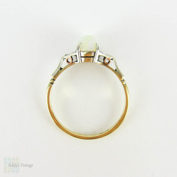 Vintage Opal Single Stone Ring, Oval Cabochon in 9 Carat White & Yellow Gold Setting. Circa 1940s.