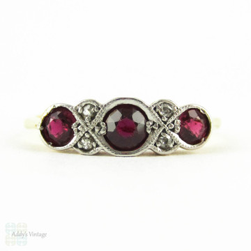 Ruby & Diamond Engagement Ring, Art Deco Three Stone Ruby Ring with Diamond Accents. Circa 1920s, 18ct & Platinum.