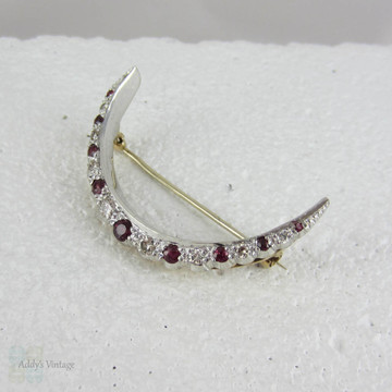 Vintage Diamond & Ruby Crescent Moon Shaped Brooch. Art Deco Half Moon in White and Yellow Gold, Circa 1930s.
