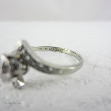 Antique Diamond Engagement Ring. Old European Cut Diamond in White Gold Bypass Style Setting, Circa Early 1900s.