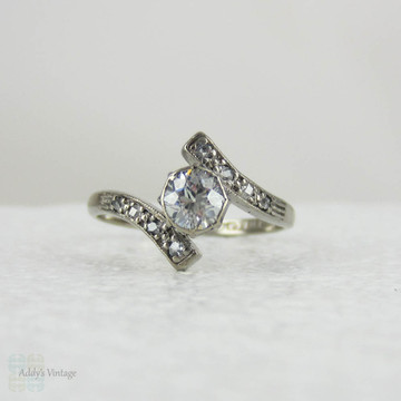 Antique Diamond Engagement Ring. Old European Cut Diamond in White Gold Bypass Style Setting, Circa Early 1900s.