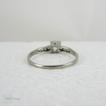 Antique Platinum Engagement Ring with European Cut Diamond in Triple Claw Fishtail Style Setting.Cathedral Setting, Circa 1920s.
