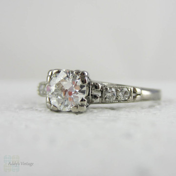 Antique Platinum Engagement Ring with European Cut Diamond in Triple Claw Fishtail Style Setting.Cathedral Setting, Circa 1920s.