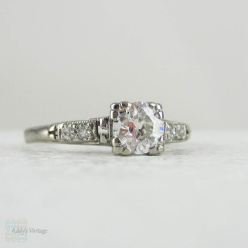 Antique Platinum Engagement Ring with European Cut Diamond in Triple Claw Fishtail Style Setting.Cathedral Setting, Circa 1920s.