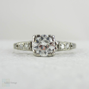 Antique Platinum Engagement Ring with European Cut Diamond in Triple Claw Fishtail Style Setting.Cathedral Setting, Circa 1920s.