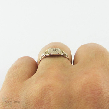 Art Deco Signet Ring by Ostby Barton, 10k Yellow Gold "RMW" Ladies Signet Ring with Engraved Flowers Circa 1920s.