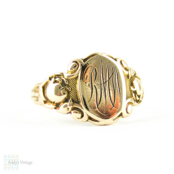 Art Deco Signet Ring by Ostby Barton, 10k Yellow Gold "RMW" Ladies Signet Ring with Engraved Flowers Circa 1920s.