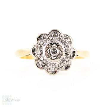 Vintage Diamond Daisy Engagement Ring, Floral Shaped Cluster Ring. 18 Carat Gold, Circa 1960s.