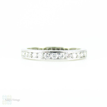 Vintage Diamond Eternity Ring, 0.68 ctw Channel Set Platinum Wedding Band. Mid 20th Century, Size K.5 / 5.5.