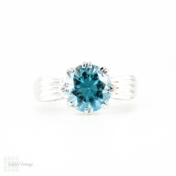 1950s Blue Zircon Ring, Vintage Single Stone Ring in Bow Style 9 ct White Gold Mounting.