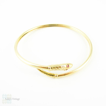 Vintage 9ct Snake Bracelet, Sprung Yellow Gold Serpent Bangle with Spinel Eyes.