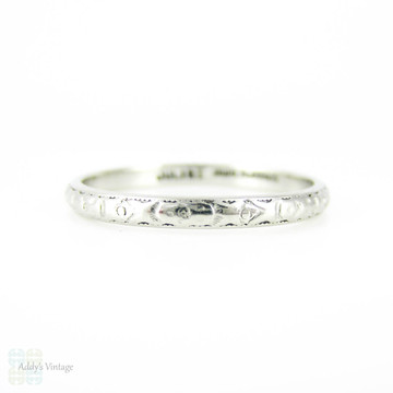 Antique Platinum Wedding Ring, Engraved Flower Pattern Ladies Wedding Band. Circa 1910s, Size O.5 / 7.5.