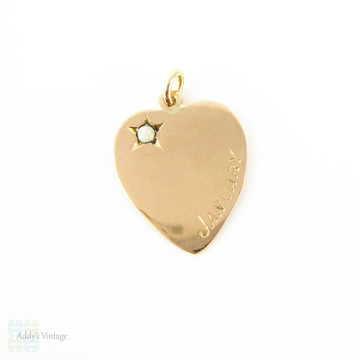 Antique Love Heart Pendant, 9ct Rose Gold Charm with Opal Inscribed January. Circa 1910s.