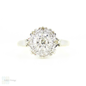 Mid Century Diamond Daisy Engagement Ring, Floral Shaped Cluster Ring. 18 Carat Gold, Circa 1940s.