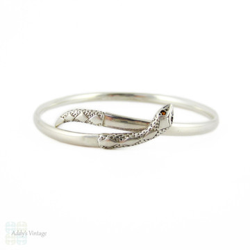 Vintage Silver Snake Bracelet with Garnet Eyes. Sterling Coiled Serpent Bangle. Mid 20th Century.