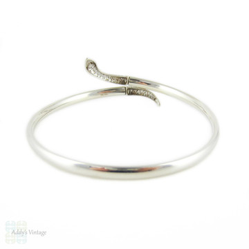 Vintage Silver Snake Bracelet with Garnet Eyes. Sterling Coiled Serpent Bangle. Mid 20th Century.