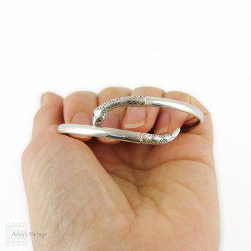 Vintage Silver Snake Bracelet with Garnet Eyes. Sterling Coiled Serpent Bangle. Mid 20th Century.