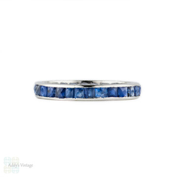 French Cut Sapphire Eternity Ring. Channel Set Platinum Wedding Band. Circa 1930s, Size K / 5.25.