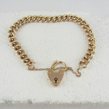 Edwardian 9 Carat Rose Gold Curb Link Bracelet with Heart Padlock Clasp with Heart Shaped Clasp, Chester Hallmark.