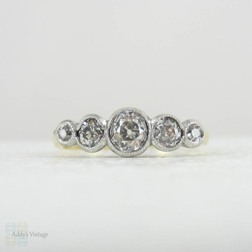 Antique Five Stone Old Mine Cut Diamond Engagement Ring. Graduated Diamonds Bezel Set in Miligrain Lined Platinum Topped 18 Carat Yellow Gold.