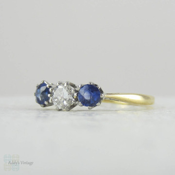 Vintage Diamond & Sapphire Three Stone Engagement Ring. Trilogy Ring with Round Brilliant Cut Diamond and Cornflower Blue Sapphire.