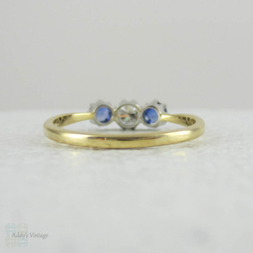 Vintage Diamond & Sapphire Three Stone Engagement Ring. Trilogy Ring with Round Brilliant Cut Diamond and Cornflower Blue Sapphire.