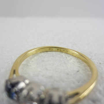 Vintage Diamond & Sapphire Three Stone Engagement Ring. Trilogy Ring with Round Brilliant Cut Diamond and Cornflower Blue Sapphire.