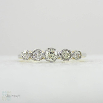 Art Deco Graduated Five Stone Diamond Ring. Half Hoop Bezel Set Diamond Engagement Ring in 18 Carat Gold with Miligrain Edges.