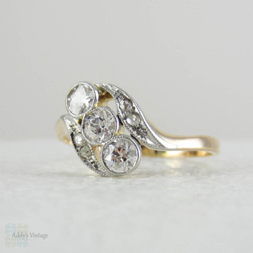 Art Nouveau Twist Shaped Diamond Engagement Ring, Old European & Rose Cut Diamonds in Bypass Style Design.