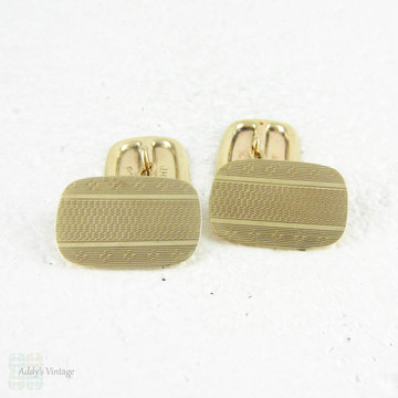 Gentleman's 9 Carat Yellow Gold Cuff Links. Double Faced Rectangle Cuff Links with Engine Turned Design, Circa 1920s - 1930s.