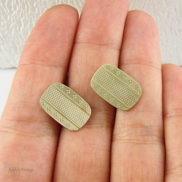 Gentleman's 9 Carat Yellow Gold Cuff Links. Double Faced Rectangle Cuff Links with Engine Turned Design, Circa 1920s - 1930s.