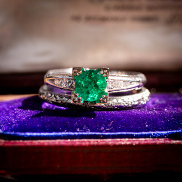 Vintage Platinum 0.75ct Emerald Engagement Ring with Diamond Accents.