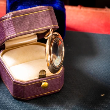 Antique Edwardian 9 Carat Gold Glass Shaker Locket with Opals.