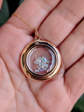 Antique Edwardian 9 Carat Gold Glass Shaker Locket with Opals.