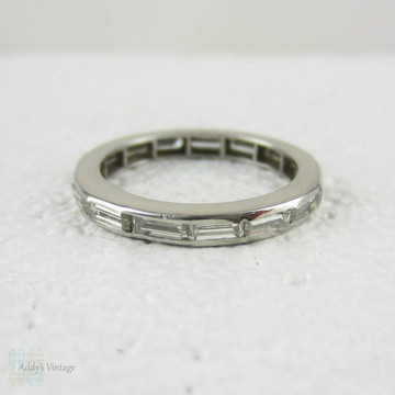 Art Deco Baguette Diamond Eternity Ring. Full Hoop Eternity Platinum Wedding Ring, Channel Set Baguettes, Circa 1920s.