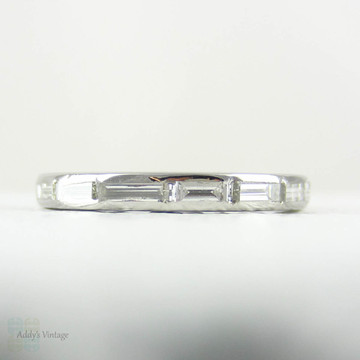 Art Deco Baguette Diamond Eternity Ring. Full Hoop Eternity Platinum Wedding Ring, Channel Set Baguettes, Circa 1920s.