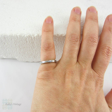 Art Deco Baguette Diamond Eternity Ring. Full Hoop Eternity Platinum Wedding Ring, Channel Set Baguettes, Circa 1920s.