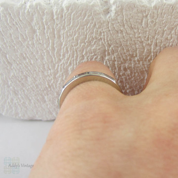 Art Deco Baguette Diamond Eternity Ring. Full Hoop Eternity Platinum Wedding Ring, Channel Set Baguettes, Circa 1920s.