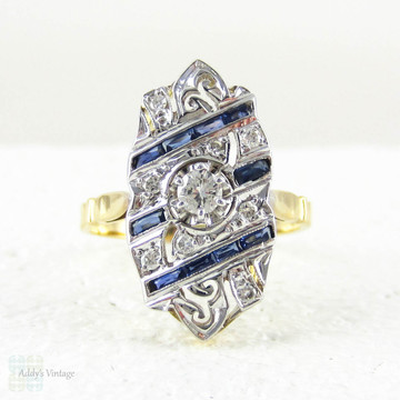 French Art Deco Diamond & Sapphire Dinner Ring. Large Panel Shape Cocktail Ring with Blue Baguette Sapphires & Diamonds, Circa 1920s.