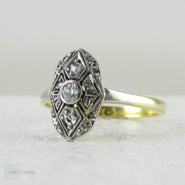 Art Deco Navette Shaped Old Mine Cut Diamond Ring with Geometric Design Pierced Filigree in Two-Tone Gold, Circa 1920s.