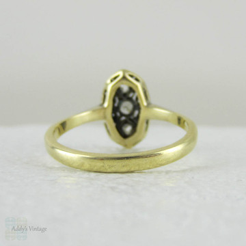 Art Deco Navette Shaped Old Mine Cut Diamond Ring with Geometric Design Pierced Filigree in Two-Tone Gold, Circa 1920s.