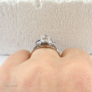 Edwardian Platinum Diamond Engagement Ring, Old European Cut Diamond in Filigree Setting with Sapphire Accents, Circa 1910s.