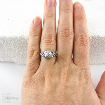 Edwardian Platinum Diamond Engagement Ring, Old European Cut Diamond in Filigree Setting with Sapphire Accents, Circa 1910s.