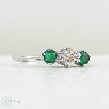 European Diamond & Light Green Emerald Engagement Ring. Antique Trilogy Ring set in White Gold, Early 20th Century.