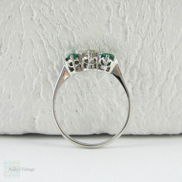 European Diamond & Light Green Emerald Engagement Ring. Antique Trilogy Ring set in White Gold, Early 20th Century.