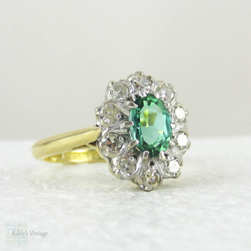 Vintage Green Tourmaline Ring with Diamond Halo, 18 Carat Gold Engagement Ring or Dress Ring, Circa 1940s.