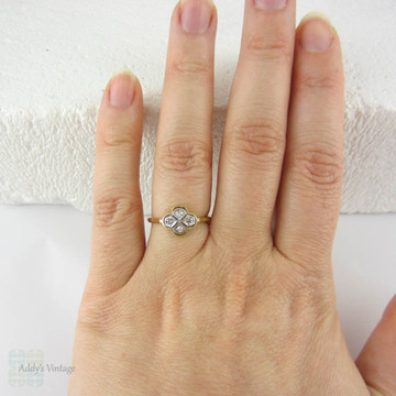 Vintage Quatrefoil Diamond Engagement Ring, Four Diamonds Set in a Clover Design, 18 Carat Gold, Circa 1920s.