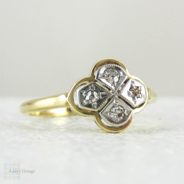 Vintage Quatrefoil Diamond Engagement Ring, Four Diamonds Set in a Clover Design, 18 Carat Gold, Circa 1920s.